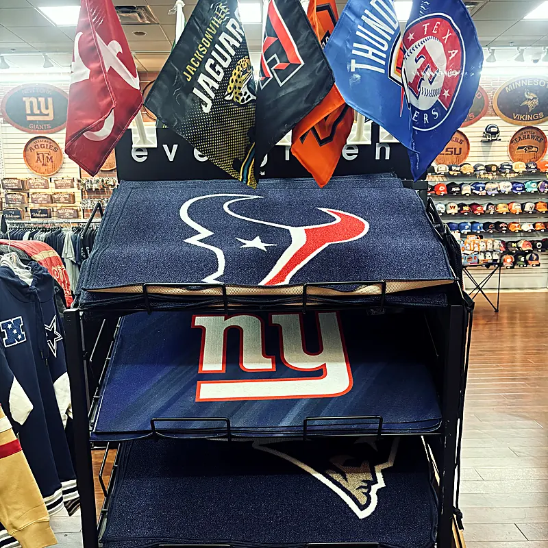 Team door mats and flags: Texans, Giants, Patriots and Cardinals