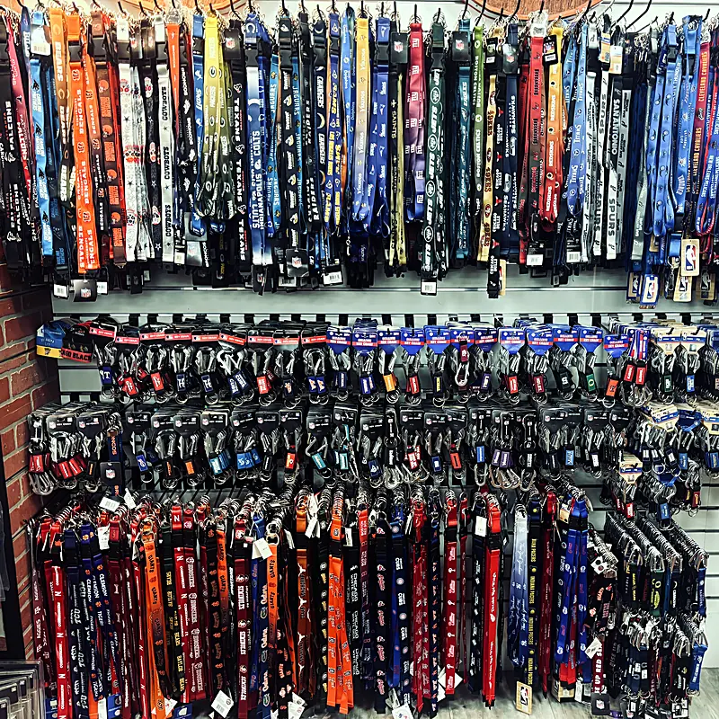 Wall of team lanyards and accessories